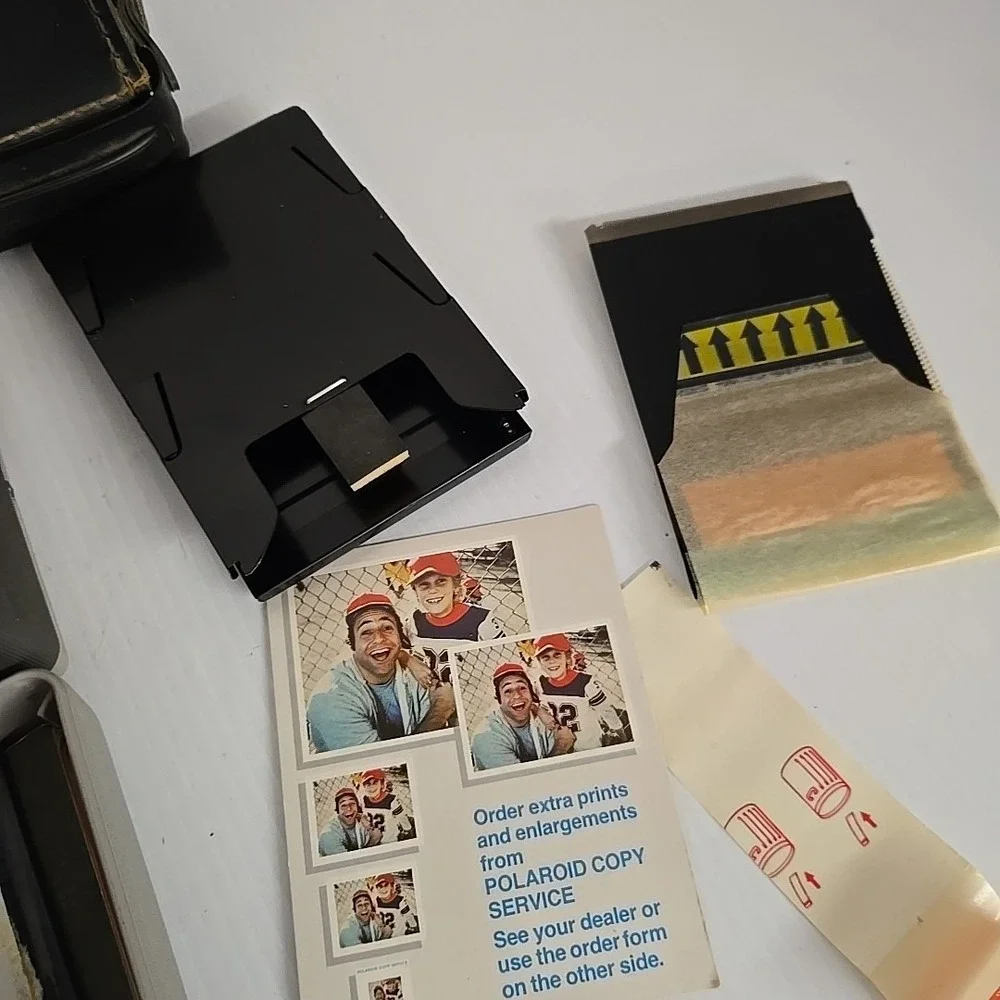 Vintage Polaroid Automatic 104 Instant Film Land Camera with Case and Extras